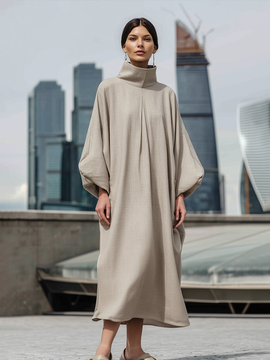 Elegantna maxi obleka s visokim ovratnikom in kokonsko silhueto