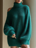Zeleni pulover s turtleneck in off-shoulder krojem